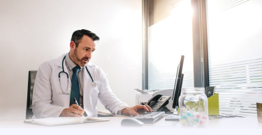 doctor using a computer